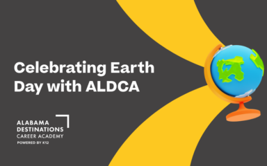 Graphic promoting Earth Day with the text ‘Celebrating Earth Day with ALDCA,’ featuring a colorful blue and green globe on a stand, the Alabama Destinations Career Academy logo, and a dark gray background with yellow abstract curves.